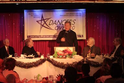 Harvey Evans honoring the men at the table